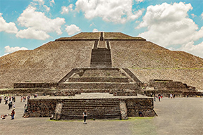 Ancient ruins of Teotihuacan under a clear sky.